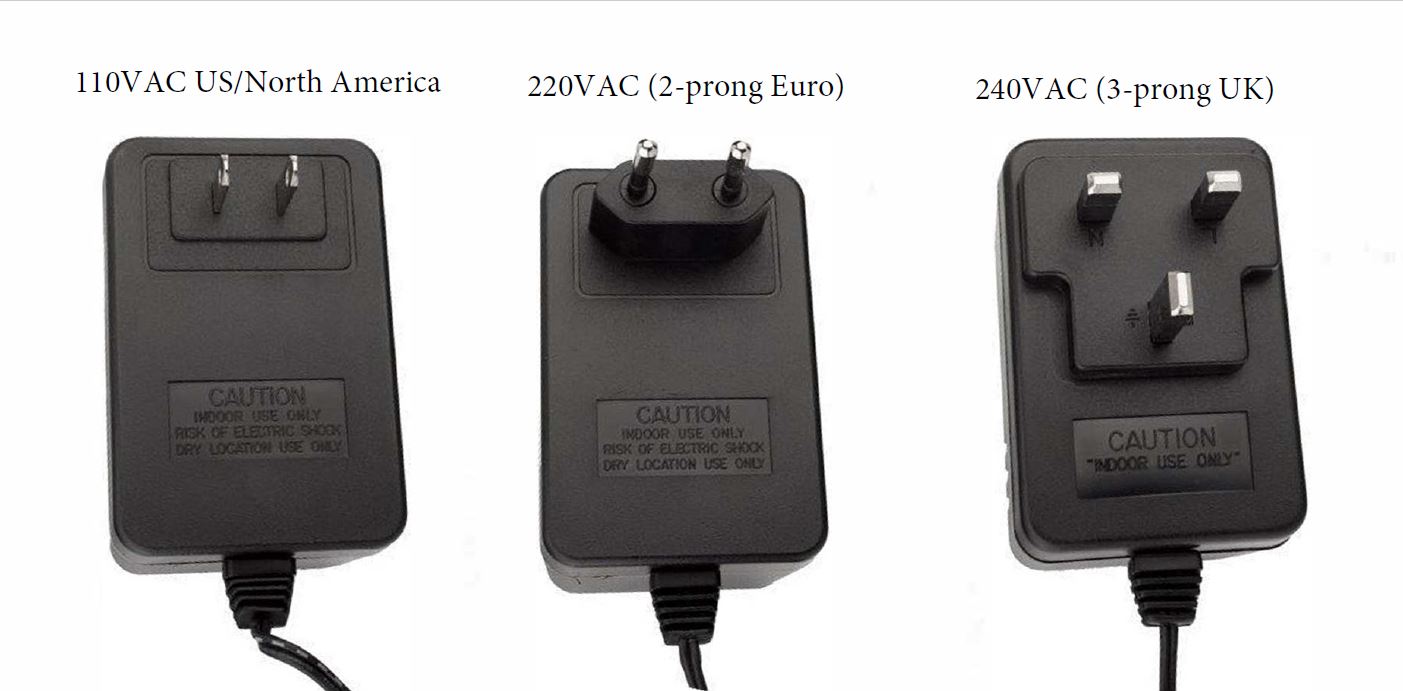 An image of three power supply transformers. Two prong 120 volt US/NA, two prong 220 volt EU, and three prong 240 volt UK